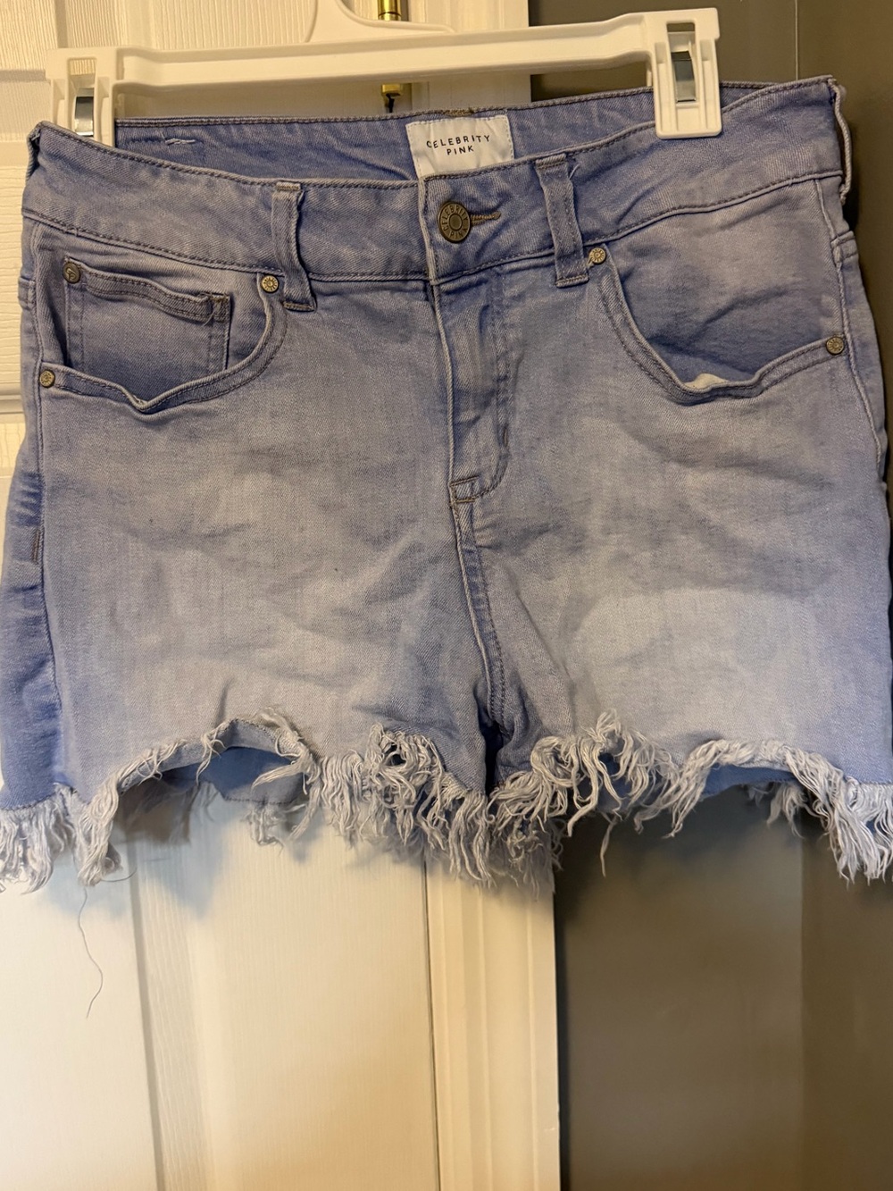 Celebrity Pink Light Wash Frayed Hem Denim Shorts